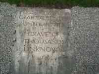 Grave marker saying "Grave of Thousands Unknown"