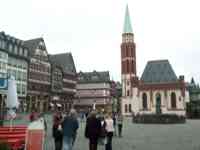 Square with fountain and old buildings