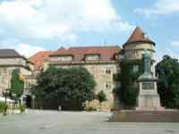 Old castle and statue