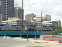 Amtrak train in front of city