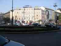 Building with a Burger King at ground level and McDonald's sign on roof