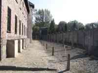 Several fences and brick building