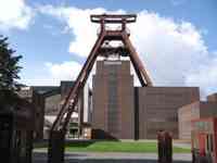 Diagonal metal structure over brick mine building