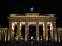 Front of Brandenburg Gate lit in white