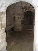 Underground prison cell with toilet holes