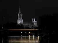 White streak of train crossing Danube in front of Münster